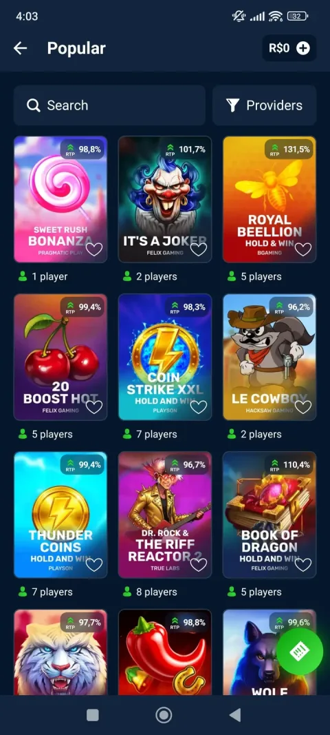 The Popular list - RTP badges (98.8% to 131.5% in this view) and player counts on every tile.